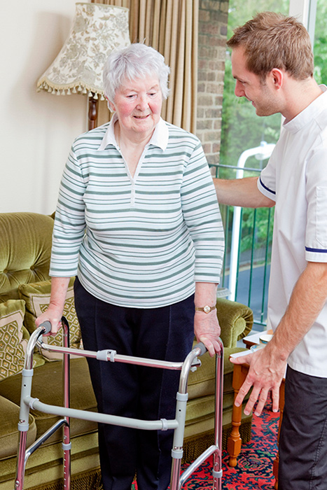 senior woman using walker
