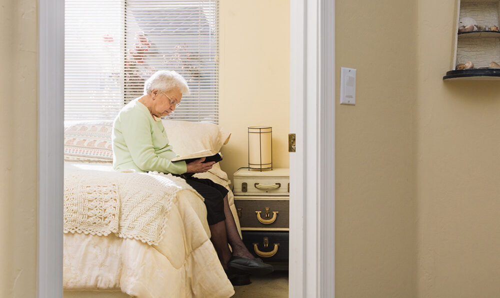 senior woman reading a book