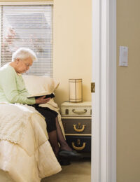 senior woman reading a book