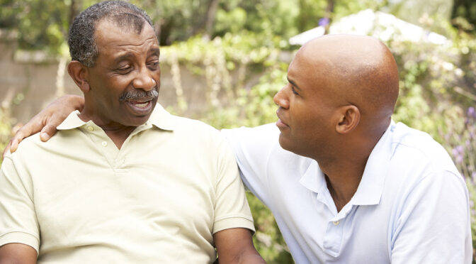 senior with son outside
