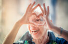 Senior Woman making a Heart Shape